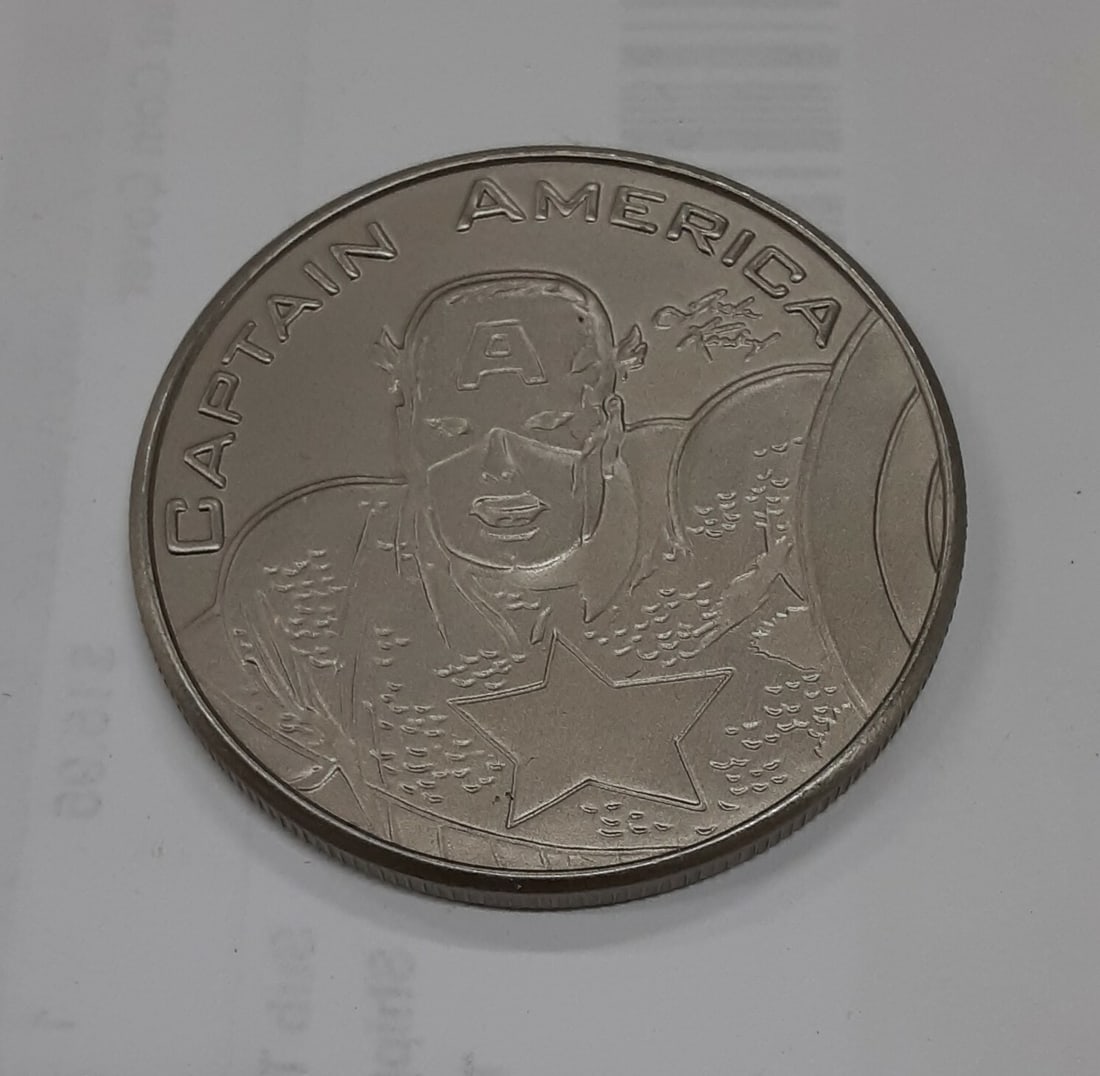 1999 Marvel Comics Captain America Collector Medal 38mm Uncirculated: 1999 Marvel Comics Captain America Collector Medal 38mm Uncirculated This 1999 Marvel Comics UNC Small Size (38mm) Collector Medal features the iconic Captain America. It is an uncirculated medal, mak