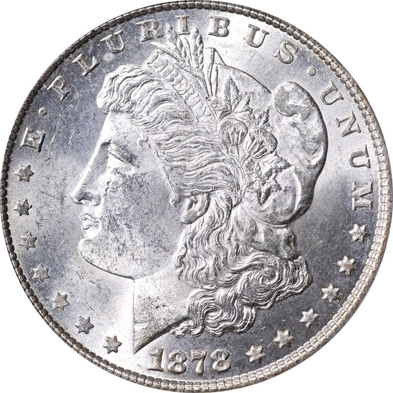 1878-P Morgan Silver Dollar PCGS MS63 Uncirculated Great Eye Appeal: 1878-P Morgan Silver Dollar PCGS MS63 Uncirculated Great Eye Appeal This original 1878-P 7TF Rev 79 Morgan Silver Dollar is a stunning piece with great eye appeal, showcasing fantastic luster and a ni