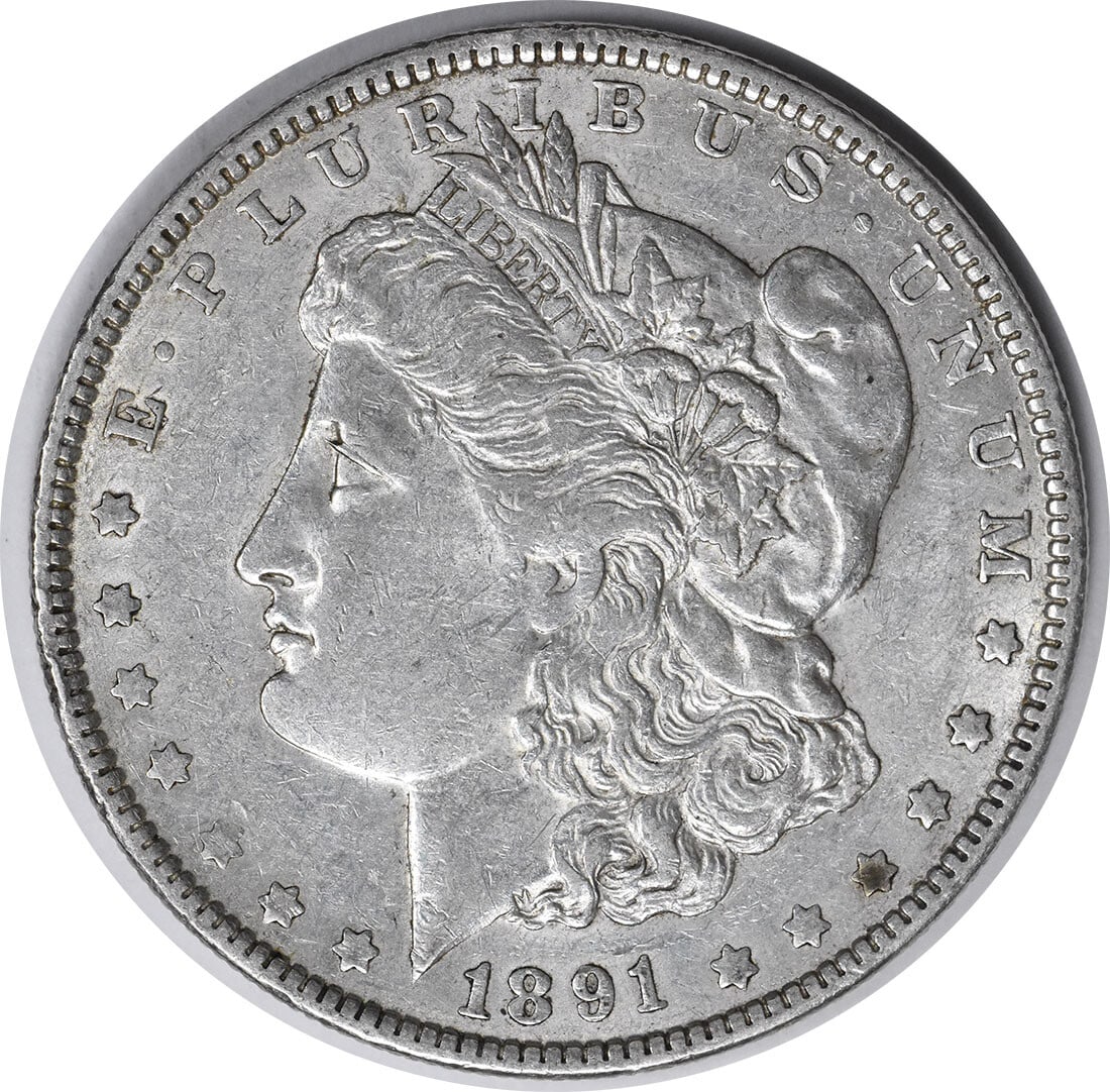 1891-O Morgan Silver Dollar Uncertified 90% Silver New Orleans Coin: 1891-O Morgan Silver Dollar Uncertified 90% Silver New Orleans Coin This 1891-O Morgan Silver Dollar is a remarkable piece of numismatic history. Struck in New Orleans, this coin features a compositio