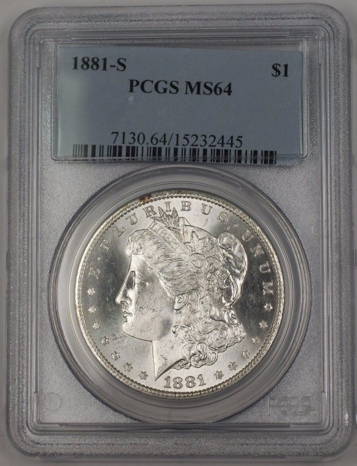 1881-S Morgan Silver Dollar PCGS MS-64 Uncirculated Coin: 1881-S Morgan Silver Dollar PCGS MS-64 Uncirculated Coin This 1881-S US Morgan Silver Dollar is a prized collectible, certified by PCGS with a grade of MS-64. It features a lightly toned surface, show