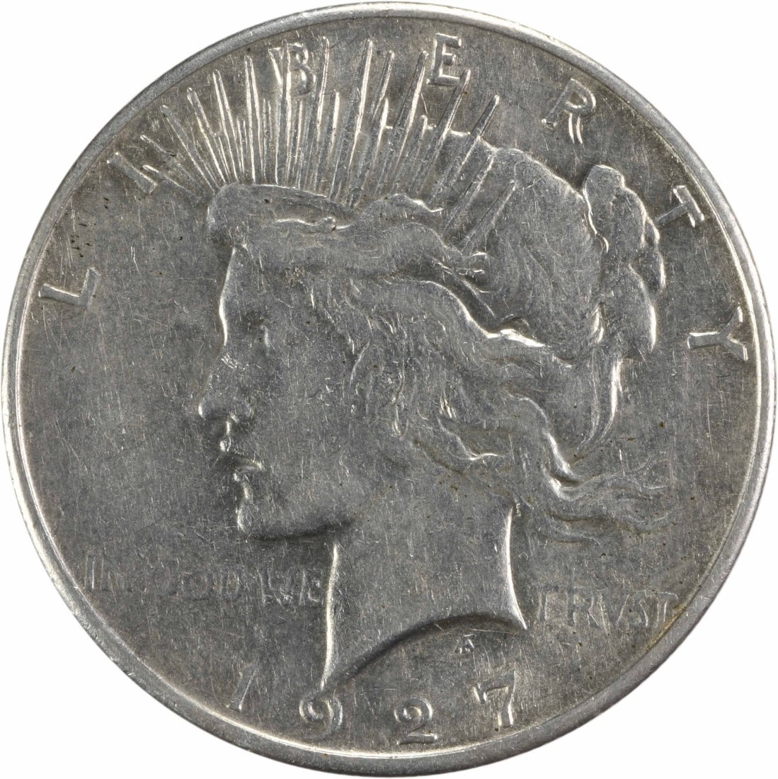 1927-S Peace Silver Dollar AU Uncertified by Anthony de Francisci: 1927-S Peace Silver Dollar AU Uncertified by Anthony de Francisci This 1927-S Peace Silver Dollar is an exceptional piece of numismatic history, featuring a design by Anthony de Francisci. The coin is