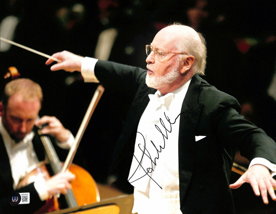 John Williams Signed 11x14 Photo Beckett Authenticated: John Williams Signed 11x14 Photo Beckett Authenticated This is an 11x14 photograph signed by renowned composer John Williams, known for his iconic scores in film history. The signature is rendered in