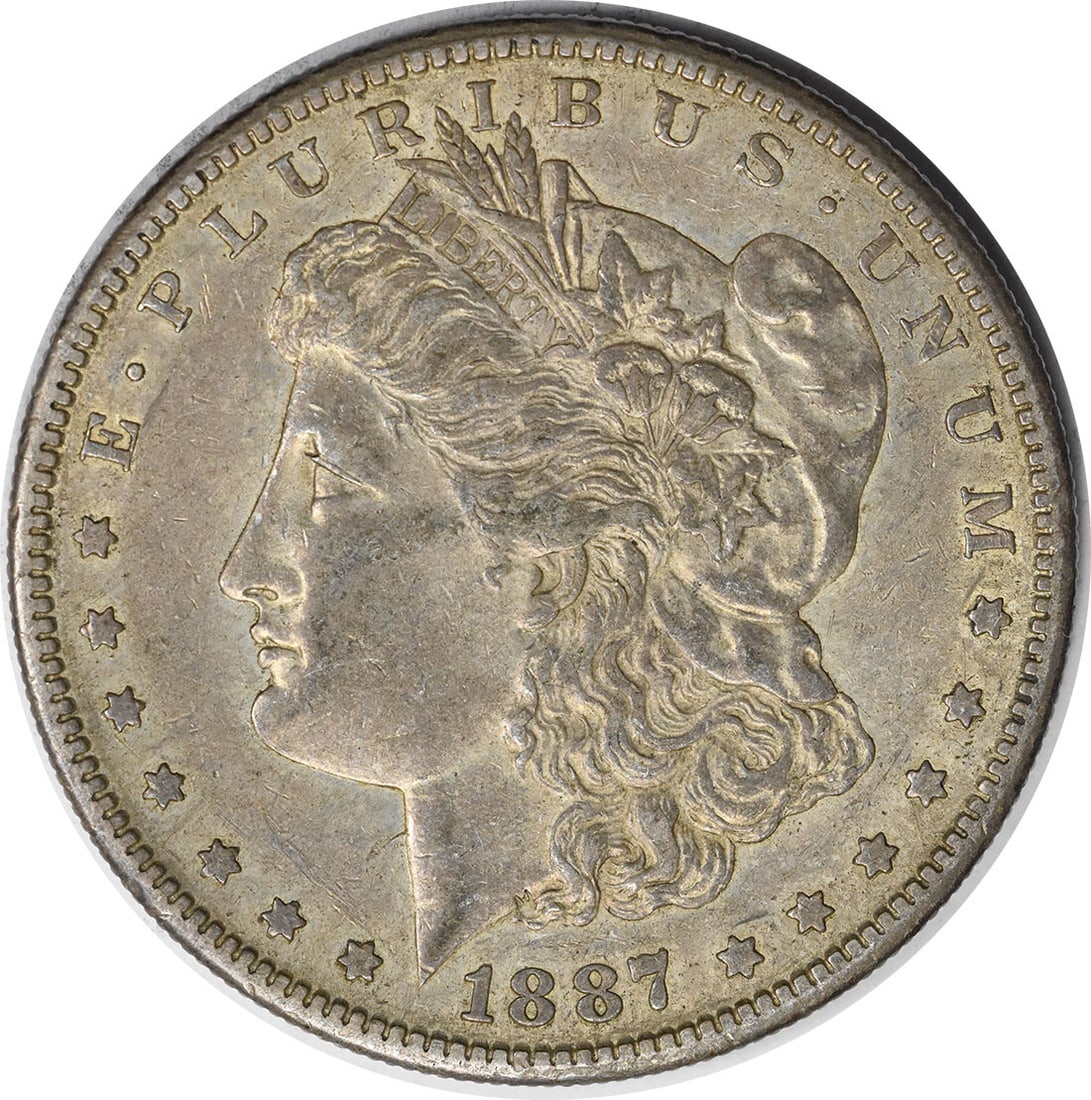 1887-S Morgan Silver Dollar AU Uncertified 90% Silver San Francisco Mint: 1887-S Morgan Silver Dollar AU Uncertified 90% Silver San Francisco Mint This 1887-S Morgan Silver Dollar features a beautiful design by George T. Morgan, showcasing the iconic Liberty head on the obv