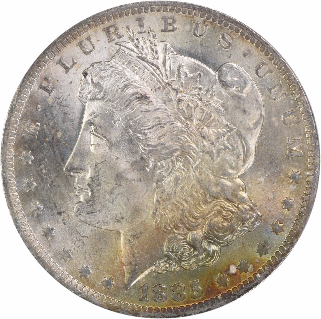 1885-O Morgan Silver Dollar Choice BU Uncertified Toned Coin: 1885-O Morgan Silver Dollar Choice BU Uncertified Toned Coin This 1885-O Morgan Silver Dollar is a beautiful example of a Choice Brilliant Uncirculated coin, featuring a stunning toning that adds to i