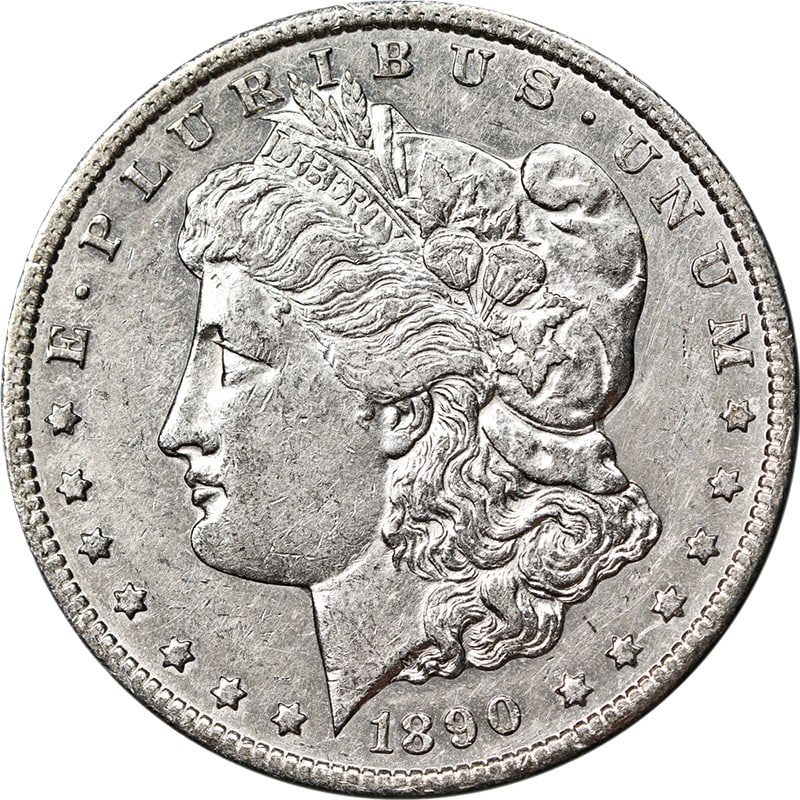 1890-CC Morgan Silver Dollar AU/BU Silver Coin Carson City: 1890-CC Morgan Silver Dollar AU/BU Silver Coin Carson City This 1890-CC Morgan Silver Dollar is a remarkable piece featuring nice eye appeal, enhanced by its bright white luster and excellent strike q