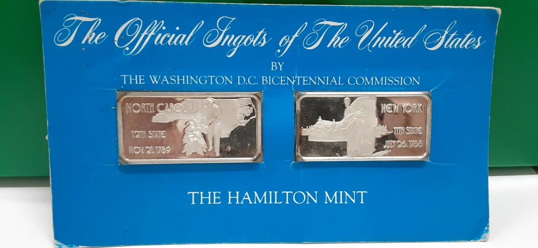 1976 Hamilton Mint NC NY .999 Fine Silver Ingot Pair 1 Troy Oz: 1976 Hamilton Mint NC NY .999 Fine Silver Ingot Pair 1 Troy Oz This listing features a pair of 1976 Hamilton Mint silver ingots commemorating the statehood of North Carolina and New York. Each ingot