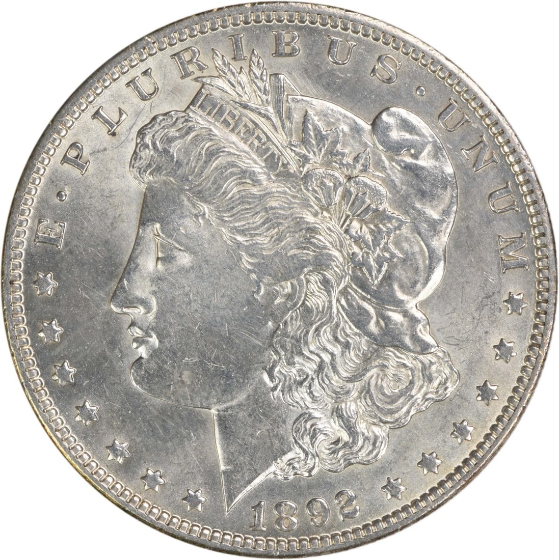 AU Slider 1892-O Morgan Dollar Uncertified Silver Coin from New Orleans Mint: AU Slider 1892-O Morgan Dollar Uncertified Silver Coin from New Orleans Mint This 1892-O Morgan Silver Dollar features an attractive AU (About Uncirculated) grade and was minted in New Orleans.