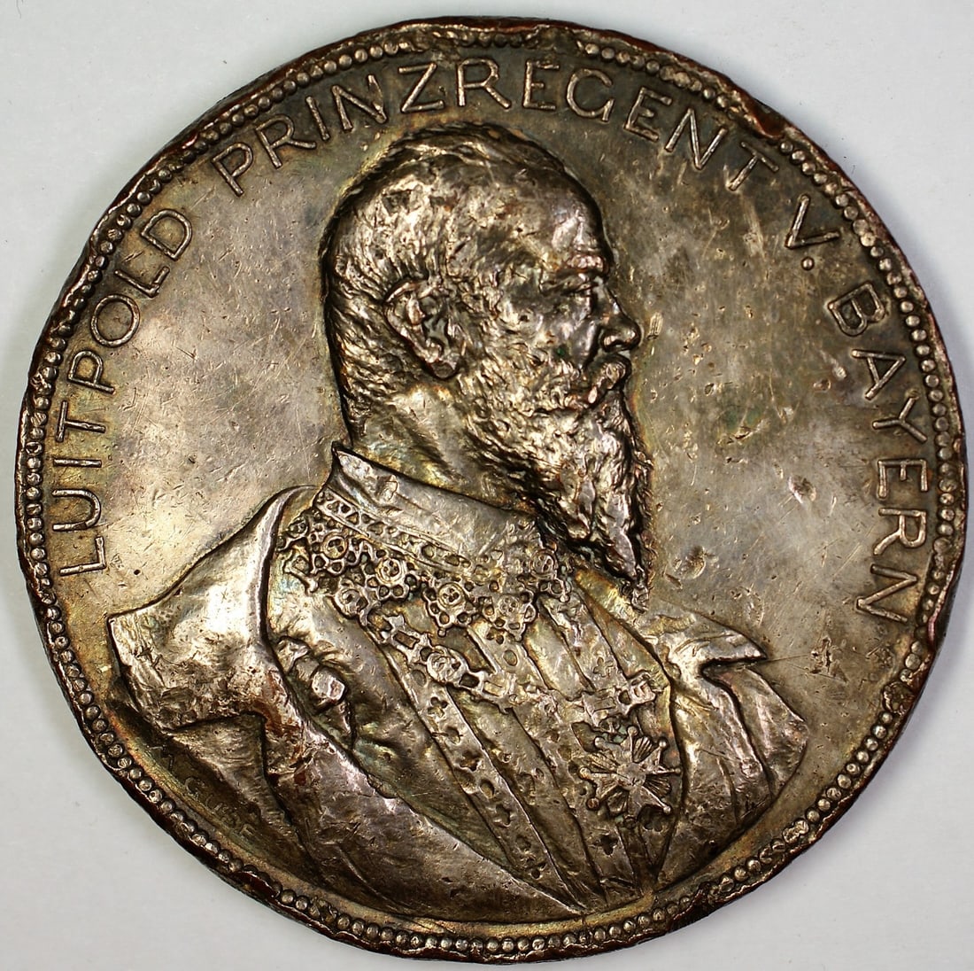 1897 Luitpold Przregent V. Bayern Heavy Silver Medal: 1897 Luitpold Przregent V. Bayern Heavy Silver Medal This 1897 Luitpold Przregent V. Bayern medal is a notable piece of exonumia, crafted from silver and showcasing significant historical value. The m