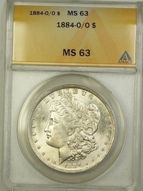 1884-O/O Over Mint Mark Morgan Silver Dollar ANACS MS 63 Coin: 1884-O/O Over Mint Mark Morgan Silver Dollar ANACS MS 63 Coin This stunning 1884-O Over Mint Mark Morgan Silver Dollar, certified by ANACS with a grade of MS 63, is an exceptional addition for any coi