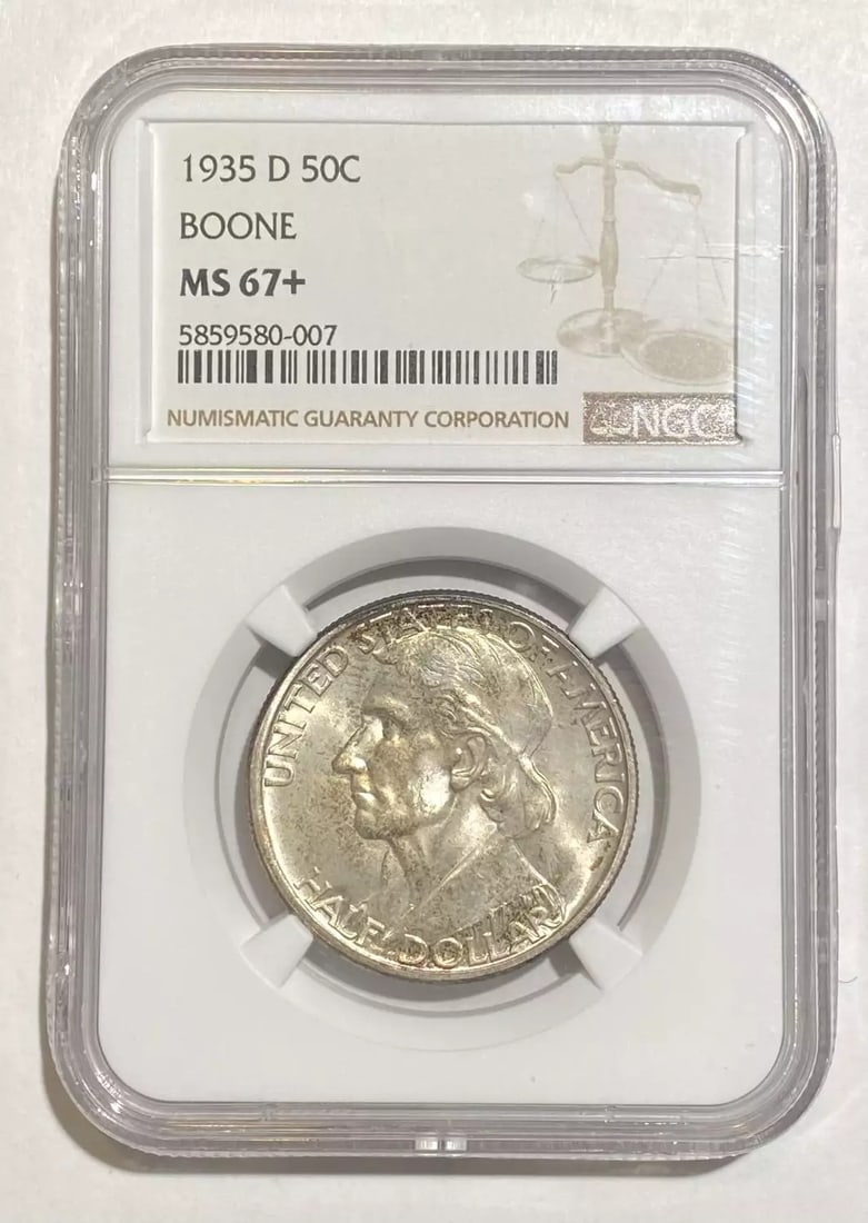 1935 D Boone Dollar NGC MS67+ Uncirculated Silver Coin: 1935 D Boone Dollar NGC MS67+ Uncirculated Silver Coin This stunning 1935 D Boone dollar is certified by NGC with a remarkable grade of MS-67+, indicating its uncirculated condition and exceptional qu