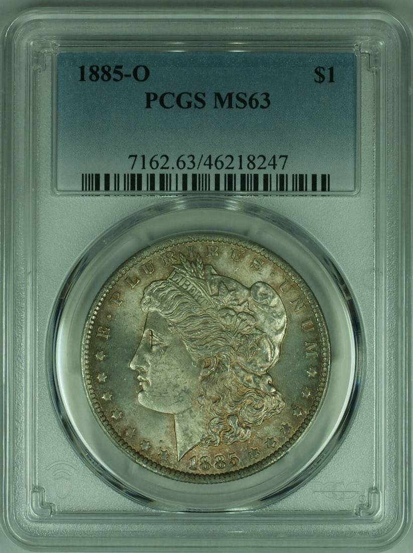 1885-O Morgan Silver Dollar Coin PCGS MS-63 with Toning: 1885-O Morgan Silver Dollar Coin PCGS MS-63 with Toning This 1885-O Morgan Silver Dollar coin is a remarkable example from the New Orleans mint, graded as MS-63 by PCGS. Featuring a composition of 90%
