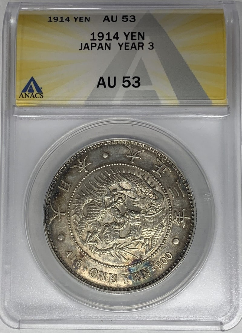 1914 Japan One Yen Coin Silver ANACS AU 53 Certified: 1914 Japan One Yen Coin Silver ANACS AU 53 Certified This 1914 Japan One Yen Coin is a remarkable piece for collectors, showcasing a striking design and historical significance. Minted in silver with