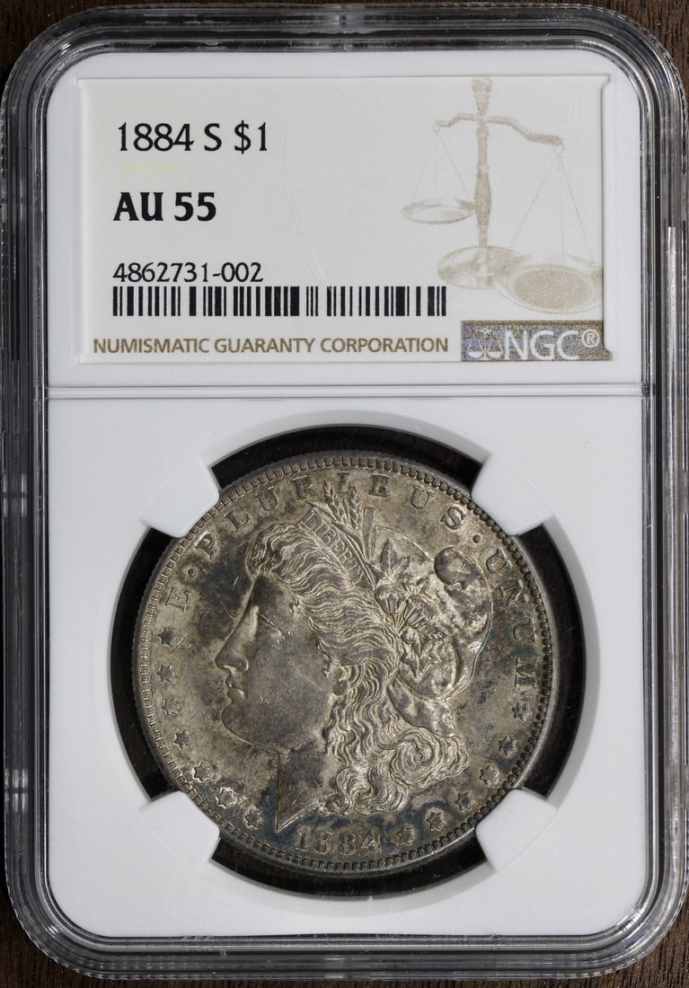 1884-S Morgan Silver Dollar AU55 NGC Key Date Coin: 1884-S Morgan Silver Dollar AU55 NGC Key Date Coin This 1884-S Morgan Silver Dollar is a remarkable key date coin, graded AU 55 by NGC. Crafted from 90% silver, this circulated piece represents a sign
