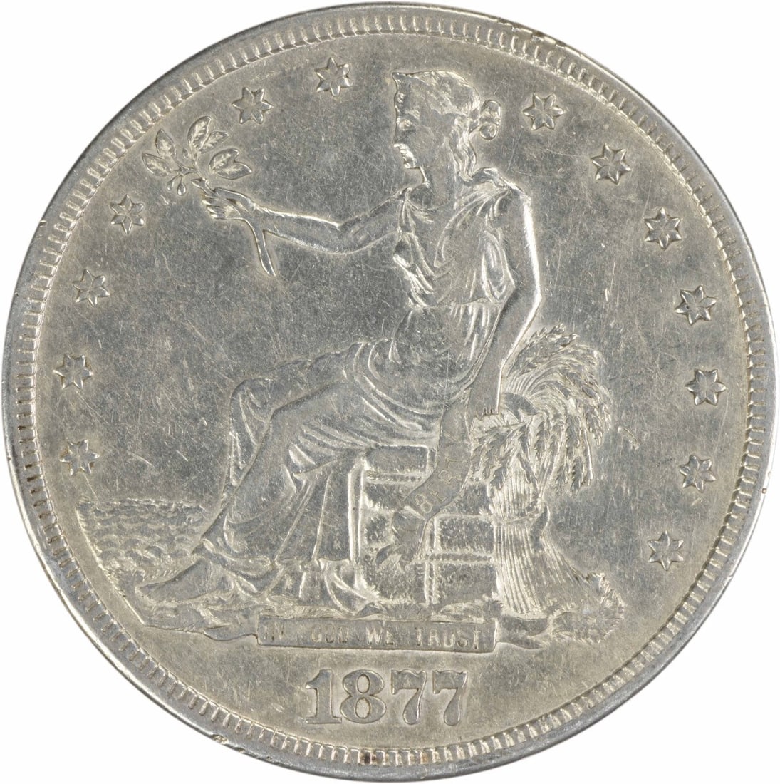 1877-S Trade Silver Dollar San Francisco 90% Silver by William Barber: 1877-S Trade Silver Dollar San Francisco 90% Silver by William Barber This 1877-S Trade Silver Dollar showcases a rich history and impressive craftsmanship. It features a design by William Barber, wit