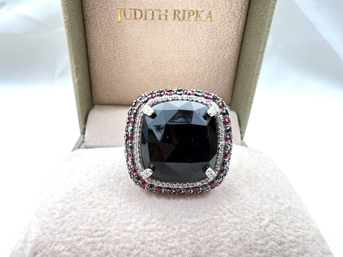 Judith Ripka 18K White Gold Ring Black Diamond Pink Sapphire Onyx: Judith Ripka 18K White Gold Ring Black Diamond Pink Sapphire Onyx This exquisite Judith Ripka ring is crafted from 18K white gold and features a stunning combination of black diamonds and pink sapphir