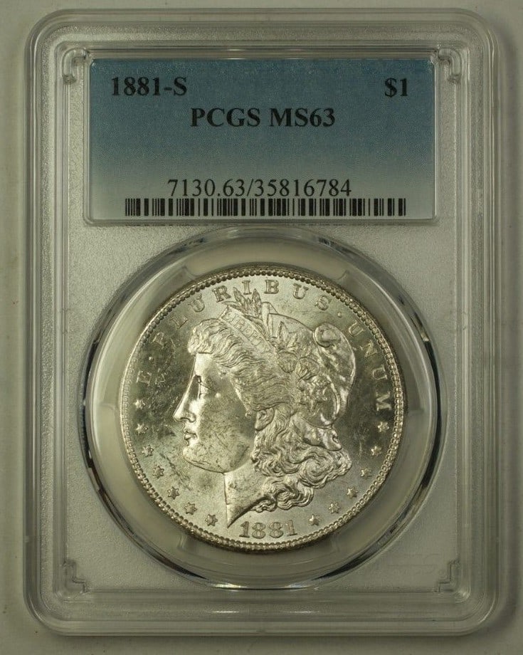 1881-S Morgan Silver Dollar PCGS MS-63 Uncirculated Coin: 1881-S Morgan Silver Dollar PCGS MS-63 Uncirculated Coin This 1881-S US Morgan Silver Dollar is an exquisite addition for any collector. Certified by PCGS with a grade of MS-63, this uncirculated coin