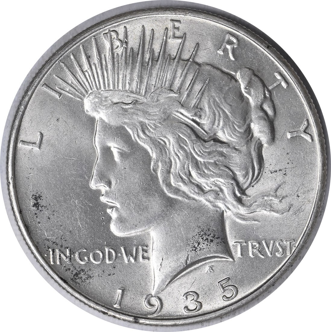 1935 Peace Silver Dollar AU Uncertified 90% Silver Coin: 1935 Peace Silver Dollar AU Uncertified 90% Silver Coin This 1935 Peace Silver Dollar features a stunning design by Anthony de Francisci and is composed of 90% silver and 10% copper. The coin, which i