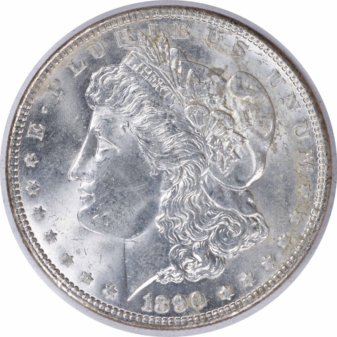 1890 Morgan Silver Dollar Choice BU Toned Uncertified Silver Coin: 1890 Morgan Silver Dollar Choice BU Toned Uncertified Silver Coin This 1890 Morgan Silver Dollar is a stunning example of numismatic art, graded as Choice BU (Brilliant Uncirculated). Crafted from sil