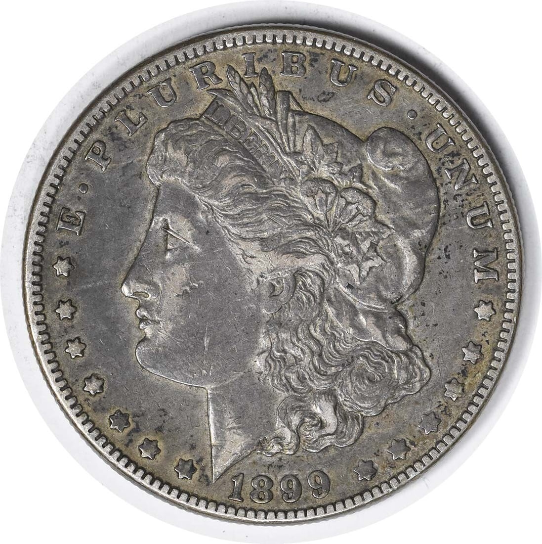 1899 VAM 6 Morgan Silver Dollar 90% Silver Uncertified Coin: 1899 VAM 6 Morgan Silver Dollar 90% Silver Uncertified Coin Discover the 1899 VAM 6 Morgan Silver Dollar, a classic collectible coin featuring exquisite design by George T. Morgan. This coin boasts a