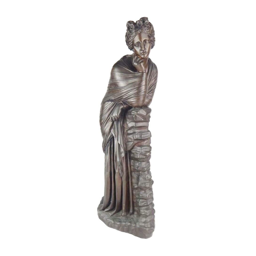 Marked Antique Bronze Woman Statue on Rock Column 22 in: Marked Antique Bronze Woman Statue on Rock Column 22 in This stunning antique bronze statue features a contemplative woman gracefully resting on a column of rocks. Crafted with precision, this medium-