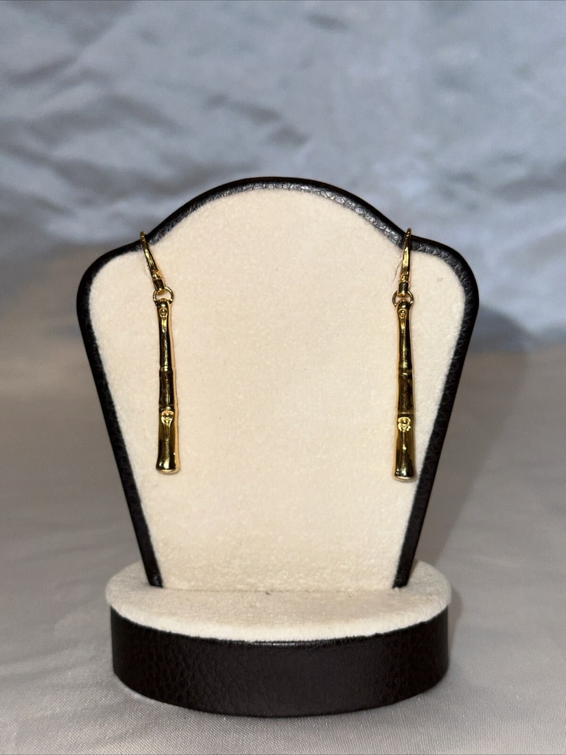 John Hardy 18K Yellow Gold Bamboo Stud Earrings: John Hardy 18K Yellow Gold Bamboo Stud Earrings Elevate your style with this stunning pair of earrings by John Hardy, crafted in luxurious 18k yellow gold. The intricate bamboo design showcases except