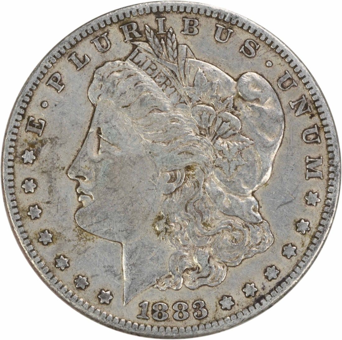 San Francisco 1883 Morgan Dollar 90% Silver EF Grade Uncertified: San Francisco 1883 Morgan Dollar 90% Silver EF Grade Uncertified This is an 1883-S Morgan Silver Dollar from the San Francisco Mint. The coin is composed of 90% silver and 10% copper, features a reede