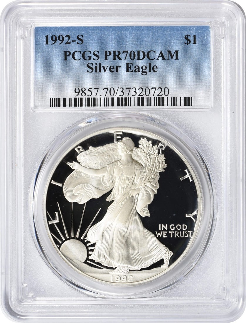 1992-S American Silver Eagle PR70DCAM PCGS 1 oz Silver Coin: 1992-S American Silver Eagle PR70DCAM PCGS 1 oz Silver Coin This exquisite 1992-S American Silver Eagle Dollar is a certified PR70 Deep Cameo by PCGS, showcasing the highest grade possible for proof c