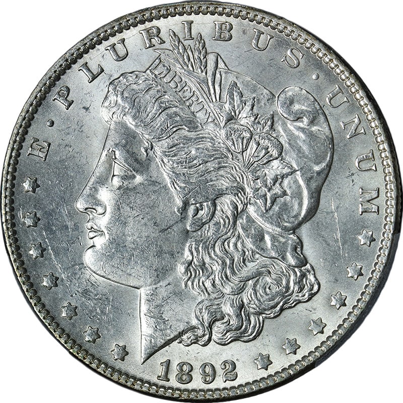 1892-P Morgan Silver Dollar PCGS MS62 Uncirculated with Nice Luster: 1892-P Morgan Silver Dollar PCGS MS62 Uncirculated with Nice Luster This stunning 1892-P Morgan Silver Dollar showcases remarkable eye appeal and luster. Graded MS62 by PCGS, it features bright white