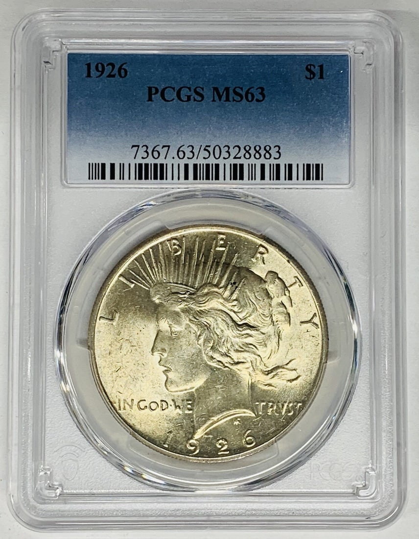 1926 Peace Silver Dollar Coin PCGS MS 63 Uncirculated: 1926 Peace Silver Dollar Coin PCGS MS 63 Uncirculated This 1926 Peace Silver Dollar Coin is a stunning example of American numismatic history. Graded MS 63 by PCGS, this uncirculated coin showcases th