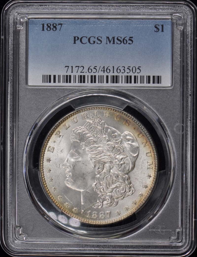 1887 Morgan Dollar PCGS MS65 Uncirculated Philadelphia Mint: 1887 Morgan Dollar PCGS MS65 Uncirculated Philadelphia Mint This 1887 $1 Morgan Dollar is a remarkable piece certified by PCGS with a grade of MS65, indicating its uncirculated condition. Minted in Ph