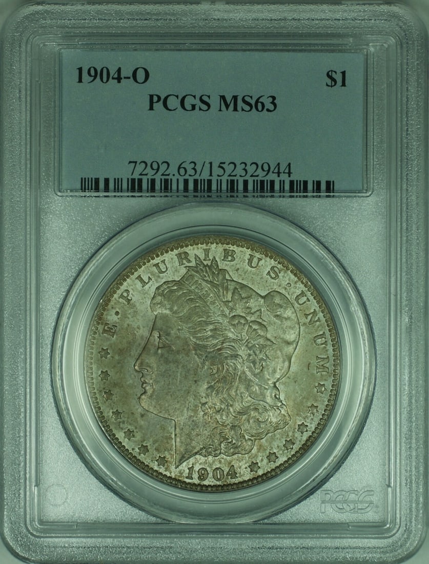 1904-O Morgan Silver Dollar PCGS MS-63 Toned Coin: 1904-O Morgan Silver Dollar PCGS MS-63 Toned Coin This stunning 1904-O Morgan Silver Dollar is a remarkable piece for any coin collector. Graded MS-63 by PCGS, this uncirculated coin features a beauti