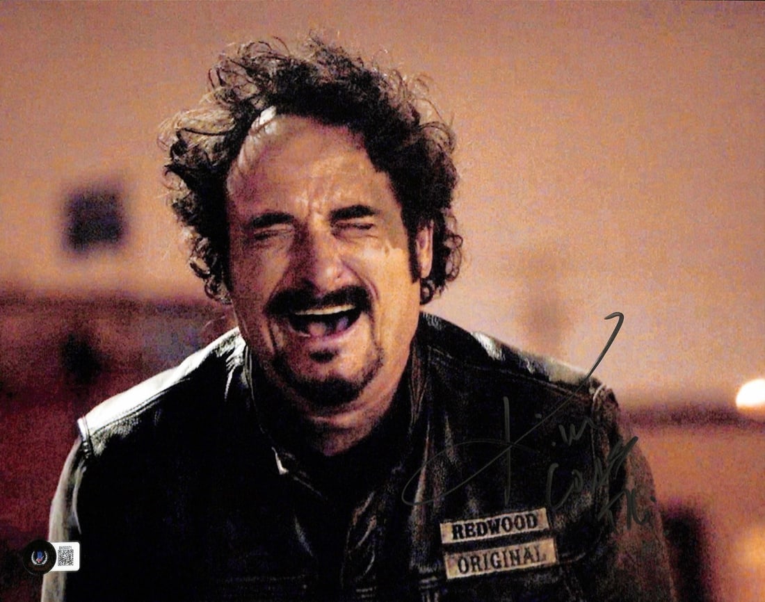 Kim Coates Signed 11x14 Sons of Anarchy Photo Beckett Certified: Kim Coates Signed 11x14 Sons of Anarchy Photo Beckett Certified This is an autographed 11x14 photograph of Kim Coates, renowned for his role as "Tig Trager" in the acclaimed television series Sons of