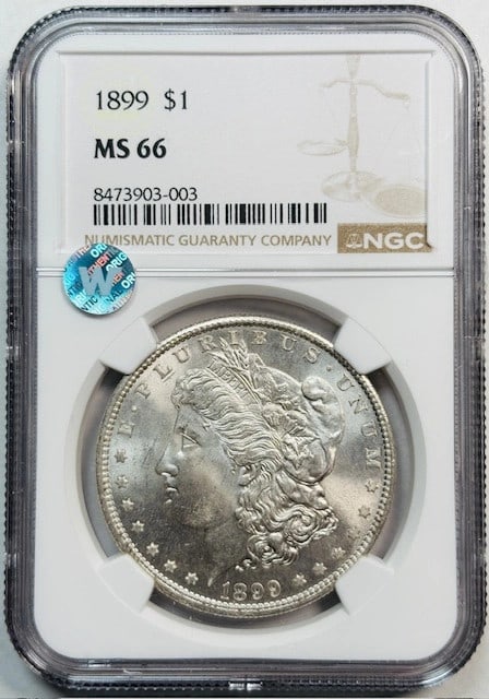 1899 Morgan Silver Dollar NGC MS-66 Uncirculated Coin: 1899 Morgan Silver Dollar NGC MS-66 Uncirculated Coin This 1899 Morgan Silver Dollar is a remarkable collectible coin, certified by NGC with a grade of MS-66, indicating it is in uncirculated conditio