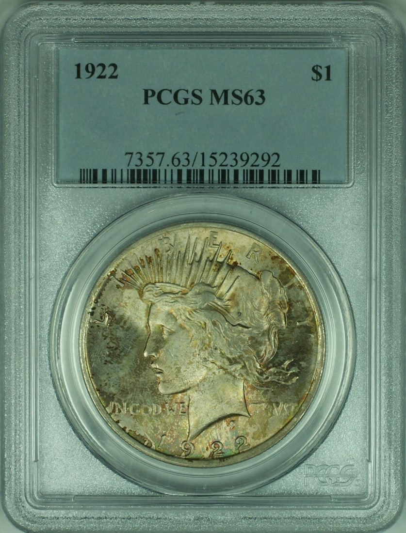 1922 Peace Silver Dollar PCGS MS63 Beautiful Toned Uncirculated Coin: 1922 Peace Silver Dollar PCGS MS63 Beautiful Toned Uncirculated Coin This beautifully toned 1922 Peace Silver Dollar is a stunning addition to any collection. Graded MS-63 by PCGS, this uncirculated c