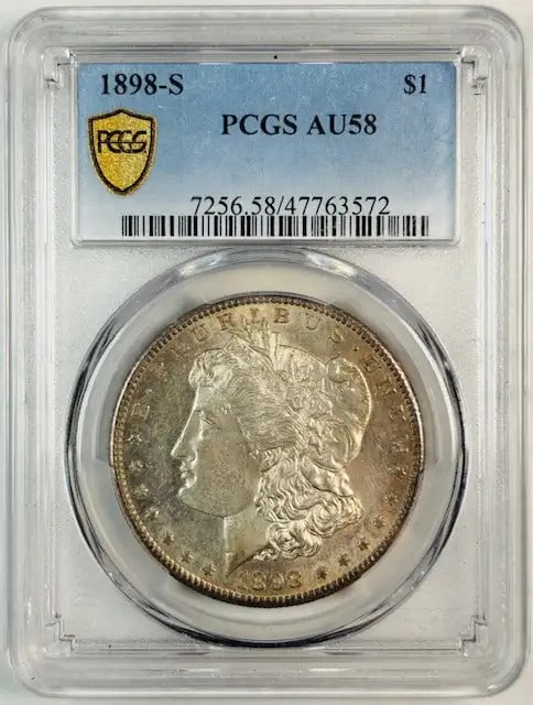 1898 S Morgan Silver Dollar PCGS AU58 San Francisco: 1898 S Morgan Silver Dollar PCGS AU58 San Francisco This 1898 S Morgan Silver Dollar is a remarkable piece of history, certified by PCGS with a grade of AU-58. Minted in San Francisco, this circulated