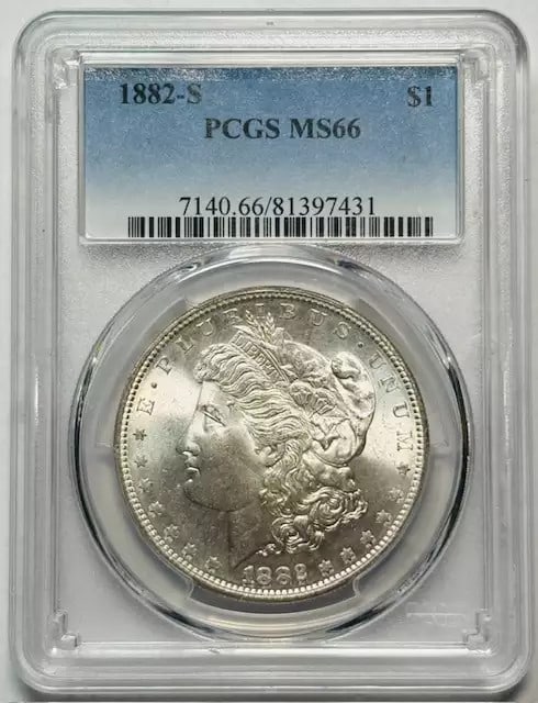 1882 S Morgan Silver Dollar PCGS MS66 Rainbow Toned: 1882 S Morgan Silver Dollar PCGS MS66 Rainbow Toned This 1882 S Morgan Silver Dollar is a stunning example of numismatic artistry, featuring a vibrant rainbow toning that enhances its visual appeal. G
