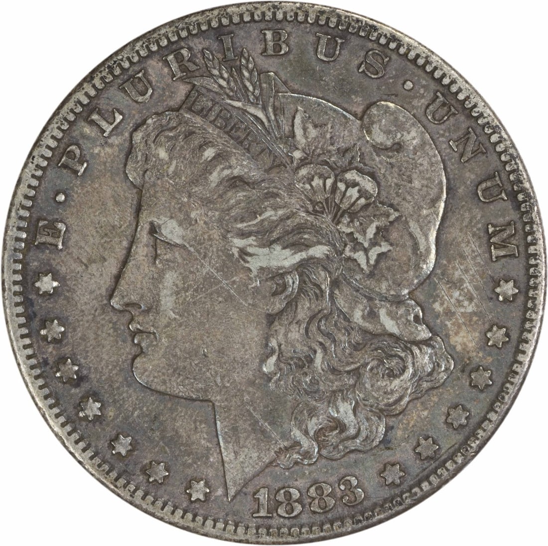 1883-S Morgan Silver Dollar XF Uncertified Silver Coin: 1883-S Morgan Silver Dollar XF Uncertified Silver Coin This 1883-S Morgan Silver Dollar is a classic collectible coin featuring a beautiful design by George T. Morgan. Struck in San Francisco, this co