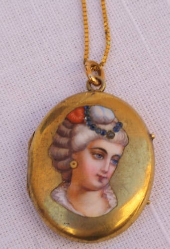 Victorian French 18K Gold Diamond Enameled Locket Necklace: Victorian French 18K Gold Diamond Enameled Locket Necklace Discover a stunning 19th century Victorian French locket crafted from 18K yellow gold, adorned with exquisite hand-painted enamel and sparkli