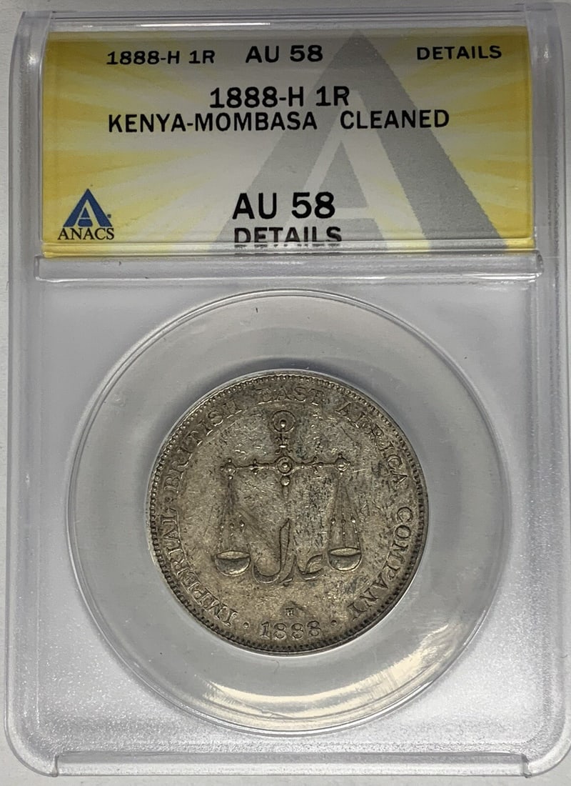 1888 Kenya 1 Rupee Coin ANACS AU 58 Cleaned: 1888 Kenya 1 Rupee Coin ANACS AU 58 Cleaned This 1888 Kenya 1 Rupee coin is a remarkable piece of numismatic history, showcasing the intricate design and craftsmanship of its time. Graded AU 58 by ANA