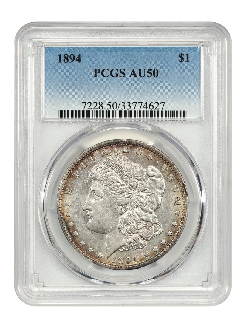 1894 Morgan Dollar PCGS AU50 Key Date with Golden Toning: 1894 Morgan Dollar PCGS AU50 Key Date with Golden Toning This 1894 $1 Morgan Dollar, certified by PCGS with a grade of AU50, is a highly sought-after key date in the Morgan dollar series. It features