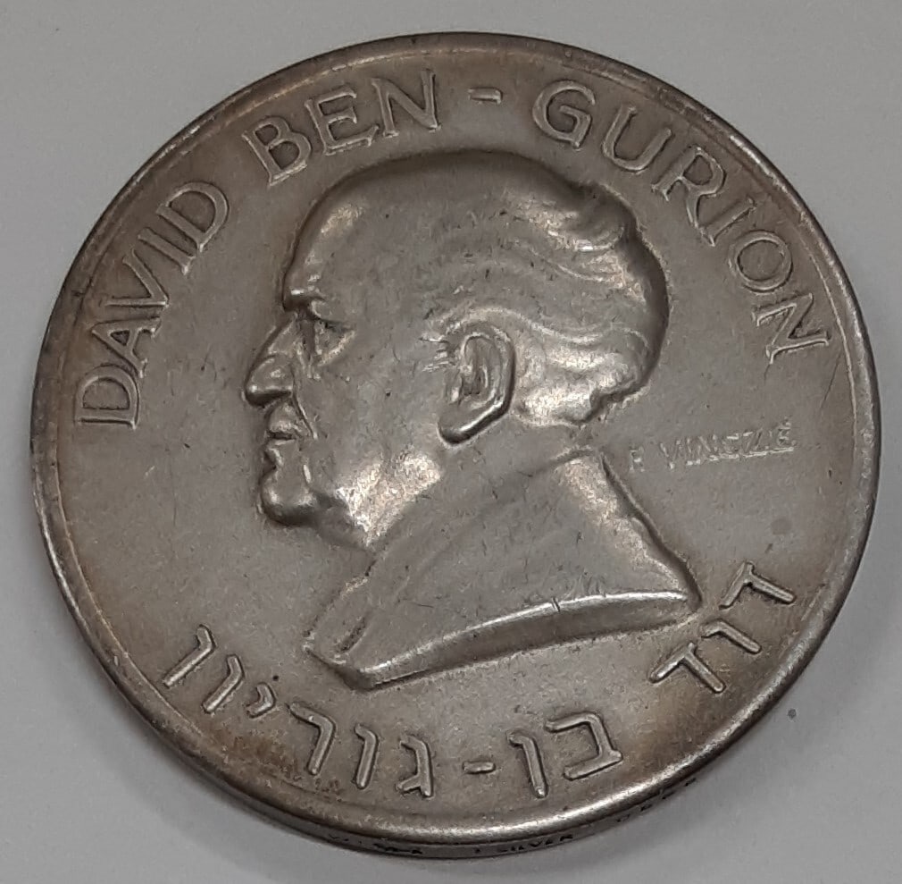 David Ben-Gurion Commemorative Fine Silver Medal 35.4g 38mm Israel: David Ben-Gurion Commemorative Fine Silver Medal 35.4g 38mm Israel This un-used fine silver medal from Israel honors David Ben-Gurion. Crafted with a silver composition and fine fineness, it weighs 35
