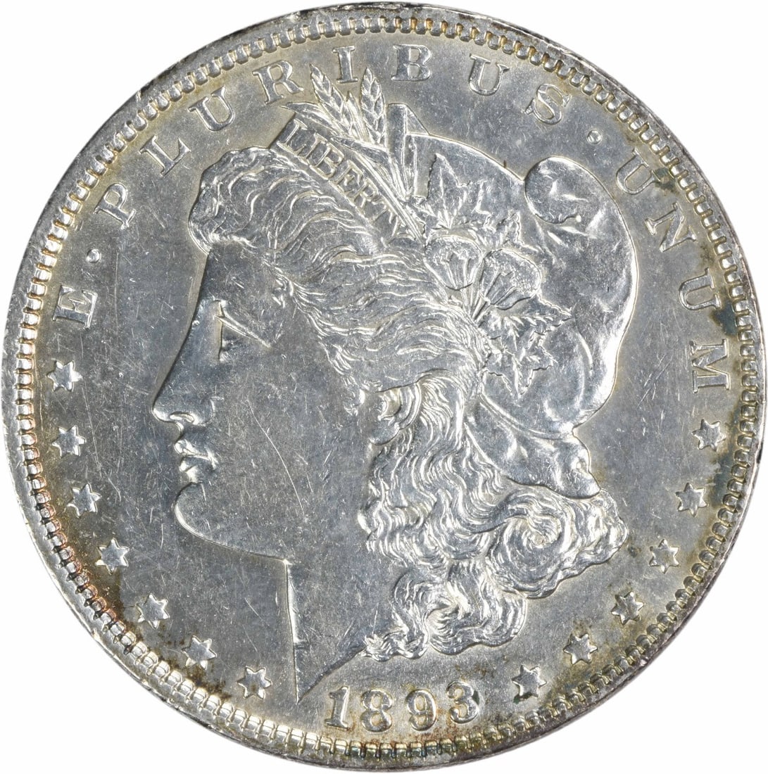 1893 Morgan Silver Dollar AU Uncertified 90% Silver Coin: 1893 Morgan Silver Dollar AU Uncertified 90% Silver Coin This 1893 Morgan Silver Dollar features a classic design by George T. Morgan. The coin is composed of 90% silver and 10% copper, showcasing its
