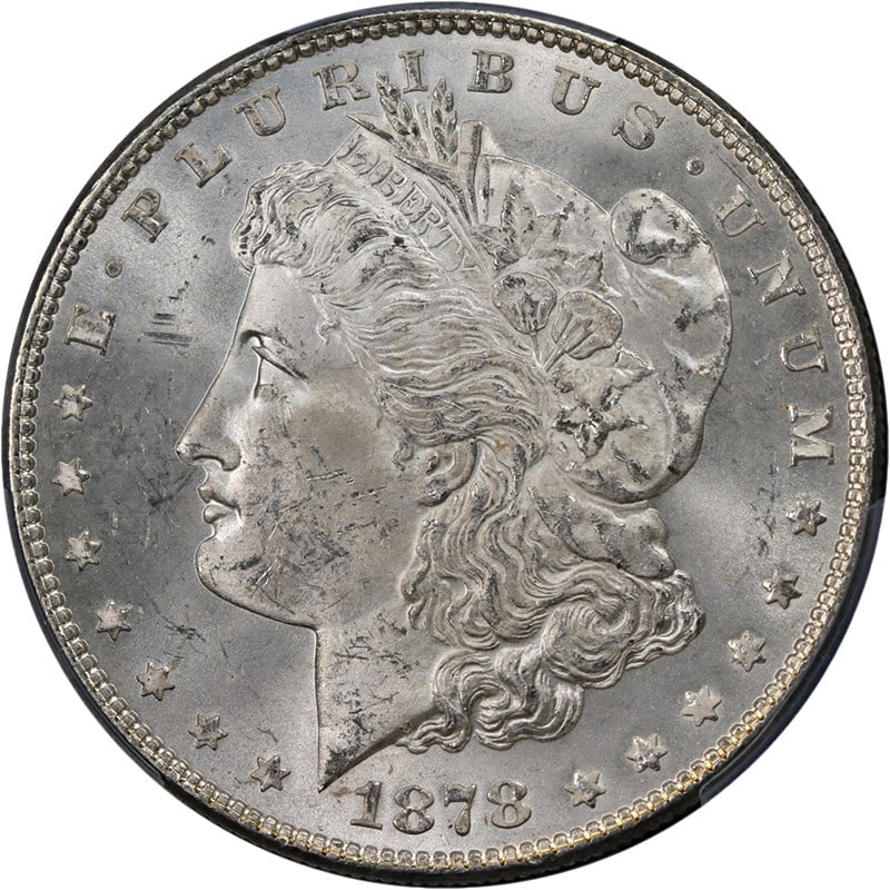 1878-P Morgan Silver Dollar 7TF Rev 78 PCGS MS63 Strong Strike: 1878-P Morgan Silver Dollar 7TF Rev 78 PCGS MS63 Strong Strike This stunning 1878-P 7TF Rev 78 Morgan Silver Dollar showcases exceptional eye appeal, featuring fantastic luster and a strong strike. Th