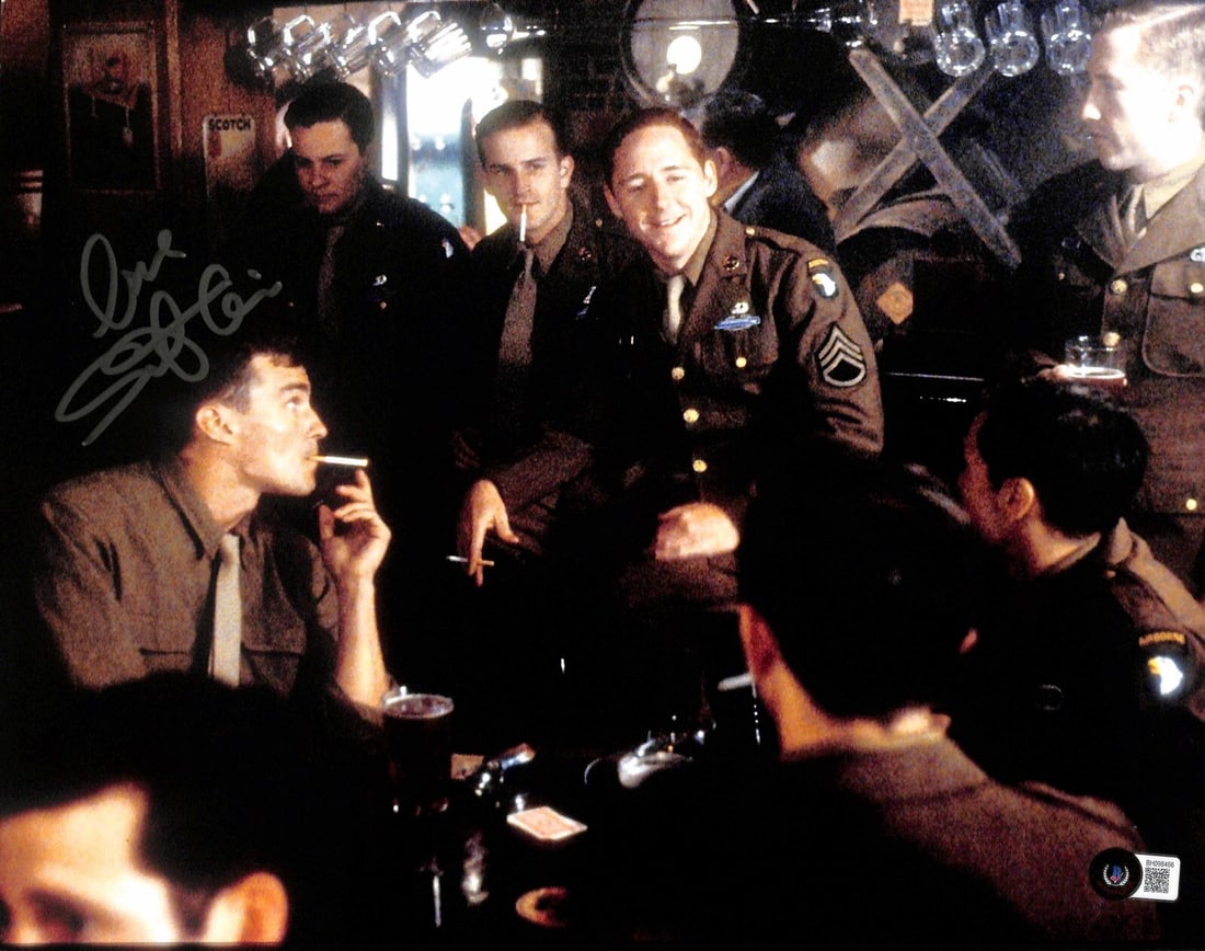 Scott Grimes Signed 11x14 Donald Malarkey Photo Band of Brothers Beckett Certified: Scott Grimes Signed 11x14 Donald Malarkey Photo Band of Brothers Beckett Certified This is an autographed 11x14 photograph of Scott Grimes, known for his role as "Donald Malarkey" in the acclaimed min