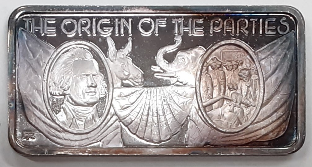 Hamilton Mint 1 Troy Oz .999 Fine Silver Bar Origin of Parties SB 83: Hamilton Mint 1 Troy Oz .999 Fine Silver Bar Origin of Parties SB 83 This Hamilton Mint silver bar features a composition of .999 fine silver and weighs 1 troy ounce. It is classified as a circulated