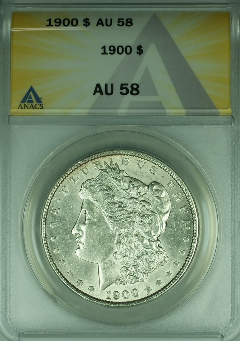 1900 Morgan Silver Dollar $1 Coin Certified ANACS AU 58: 1900 Morgan Silver Dollar $1 Coin Certified ANACS AU 58 This 1900 Morgan Silver Dollar is a stunning representation of American numismatic history. Certified by ANACS with a grade of AU 58, this coin