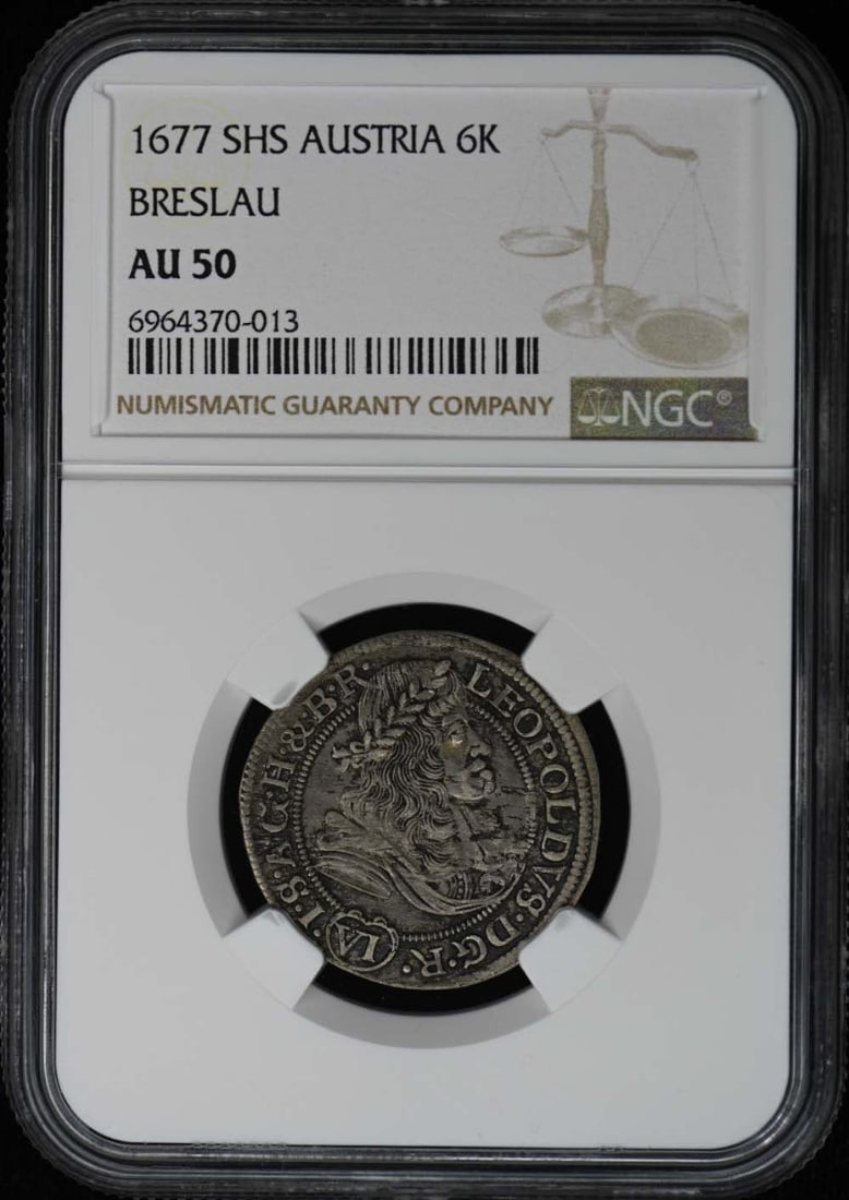 1677 SHS Austria Breslau 6K Coin NGC AU50 Certified: 1677 SHS Austria Breslau 6K Coin NGC AU50 Certified This 1677 SHS Austria Breslau coin is a remarkable collectible, graded AU50 by NGC. It features a circulated condition, showcasing its historical si