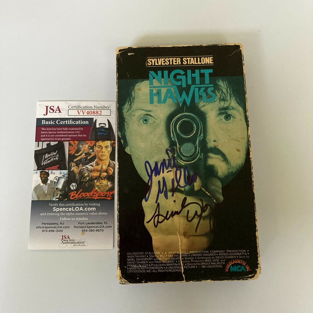 Jamie Gillis Lindsay Wagner Signed Night Hawks VHS JSA Certified: Jamie Gillis Lindsay Wagner Signed Night Hawks VHS JSA Certified This original VHS movie features the signatures of Jamie Gillis and Lindsay Wagner, making it a unique collectible for fans. The item c