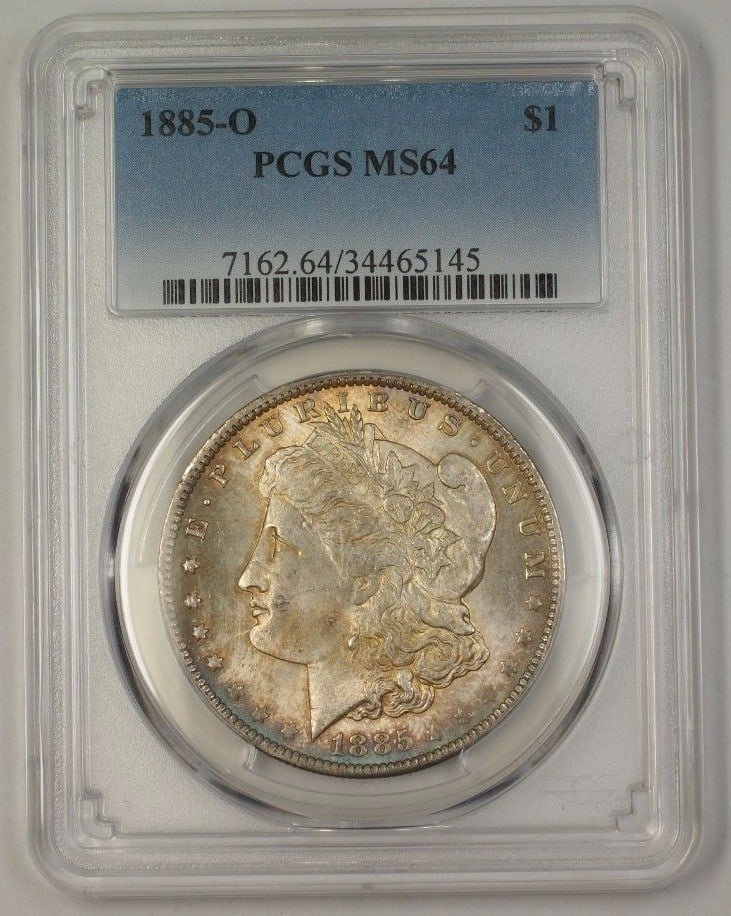 1885-O Morgan Silver Dollar $1 Coin PCGS MS-64 Uncirculated: 1885-O Morgan Silver Dollar $1 Coin PCGS MS-64 Uncirculated This 1885-O US Morgan Silver Dollar is a beautifully toned coin, graded MS-64 by PCGS, ensuring its high quality and uncirculated condition.