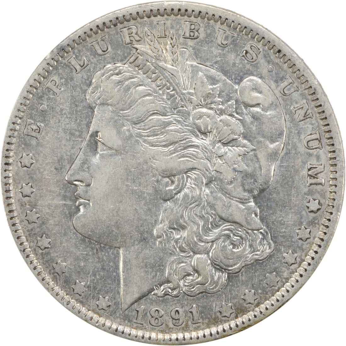 1891 New Orleans Morgan Dollar Extra Fine 90 Percent Silver Uncertified: 1891 New Orleans Morgan Dollar Extra Fine 90 Percent Silver Uncertified This is an 1891-O Morgan Silver Dollar from the New Orleans Mint, featuring a composition of 90% silver and 10% copper. Designed